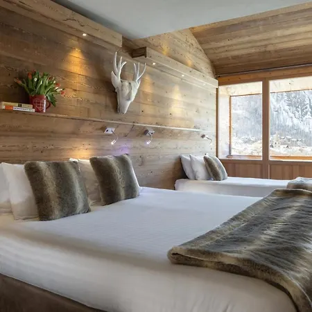 - & - Village Montana Hotel